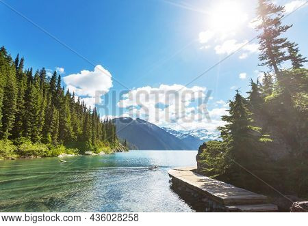 Hike to turquoise waters of picturesque Garibaldi Lake near Whistler, BC, Canada. Very popular hike destination in British Columbia.