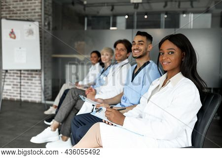 Professional International Group Of Healthcare Employees Having Medical Conference