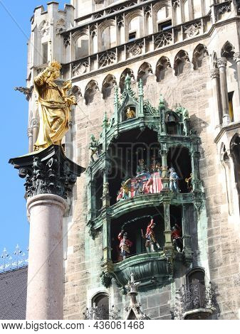 Detail Of Glockenspiel Or Carillon In The Tower Of New Town Hall In Munich Germany And The Statue Of