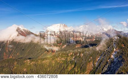 Aerial View Of Canadian Rocky Mountains With Snow On Top During Fall Season. Nature Landscape Locate