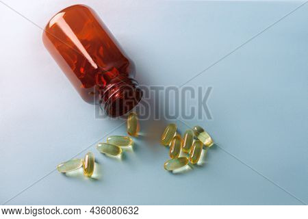 Cod Liver Oil Capsule ,fish Oil ,food Supliment With Omega 3 ,heart Care .  Top View.