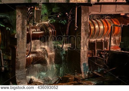 The Process Of Rolling Hot Rolled Steel In A Rolling Mill.