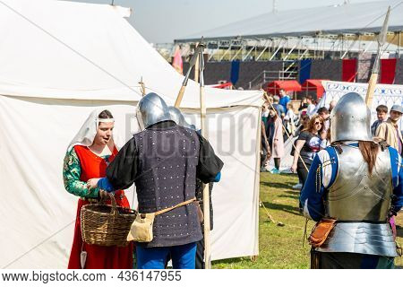 Moscow Russian Feleration 01.05. 2018. Reconstruction Of A Man In A Medieval Warrior Costume Talks T