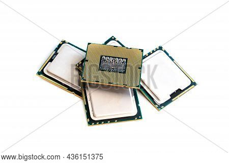 Cpu Or Microchip Computer Set With Gold Stroy On The Background Of Silver Chips