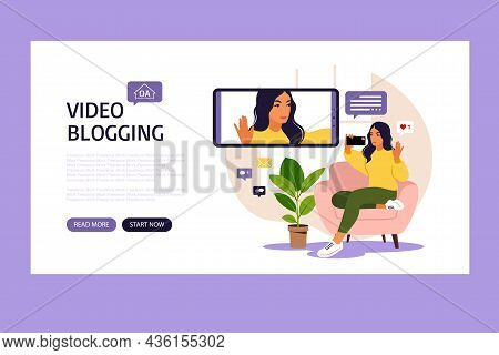 Woman Video Blogger Sitting On Sofa With Phone And Recording Video With Smartphone. Landing Page. Di