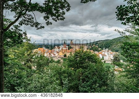 Panoramic View Of Famous Medieval Town Of Loket,elbogen, With Colorful Houses And Stone Castle Above