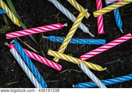 A Macro Close Up Photograph Of A Bunch Of Spiral Wax Birthday Candles Spilled And Scattered On The D