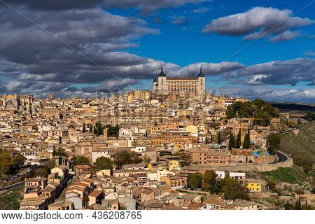 Toledo, Spain. Old City With Its Alcazar, Royal Palace Over The Tagus River Sinuosity. Spain, Europe