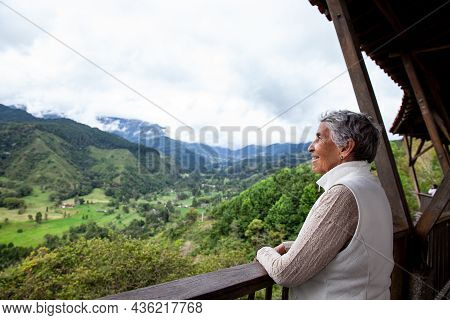 Senior Woman At The Beautiful View Point Over The Cocora Valley In Salento, Located On The Region Of