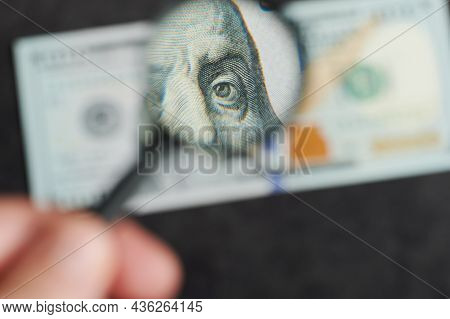 Eye Of President Franklin On 100 Dollar Us Billl Through Magnifier View