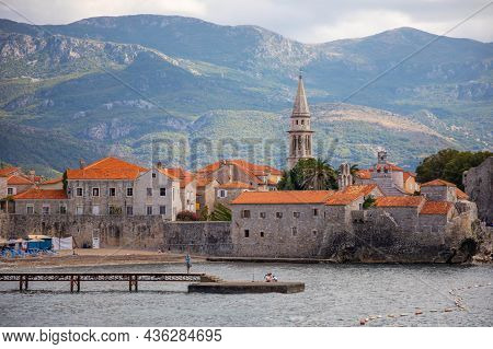 Budva, Montenegro - September 18, 2021: Landscape Of Old Town Budva. Ancient Walls And Tiled Roof Of