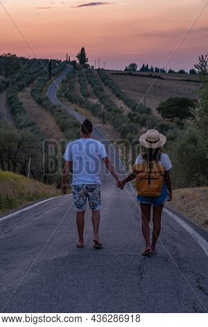 Couple Man And Woman On Vacation In Toscane Italy, Man And Woman Mid Age Visiting Toscany Region On 