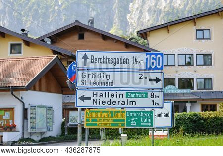 Austria - July 6, 2011: Multiple Arrows On Street Sign With Destination To Berchtesgaden, Grodig, St