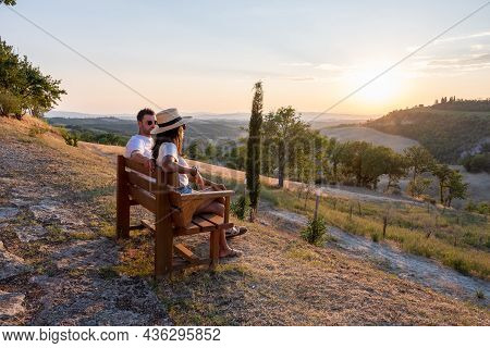 Couple Man And Woman On Vacation In Italy Toscane Watching The Golden Hills Of Toscane In Italy Euro