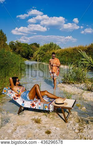 Couple Man And Woman On Vacation In Italy Toscane Watching The Golden Hills Of Toscane In Italy Euro