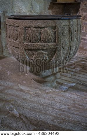 Caceres, Spain - Jan 14th, 2021: Baptismal Font Of Church Of Santiago, Early Site Of The Military Or