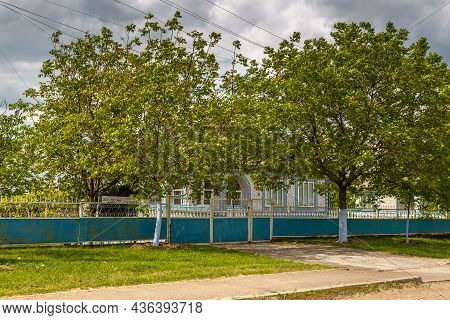 Gradiste, Gagauzja, Republic Of Moldova - 02 May 2016: View Of The Buildings And The Gravel Road In 