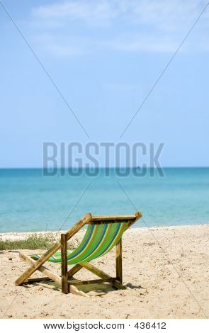 Tage en lur på stranden