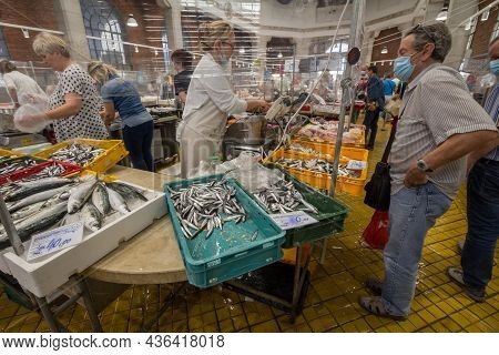 Rijeka, Croatia - June 18, 2021: Two Women, Workers, Selling Fish And Seafood In Ribarnica Rijeka Th