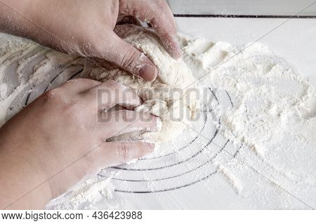 Housewife's Hands Knead Dough For Homemade Baking With Copyspace. Concept Home Baking, Kitchen. Prep