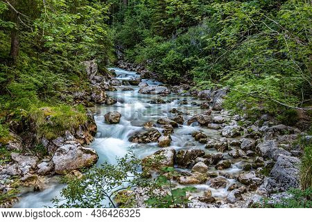 Magic Forest Zauberwald At Lake Hintersee With Creek Ramsauer Ache. National Park Berchtesgadener La