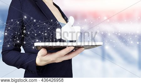Congratulate, Good And Like Concept. Hand Hold White Tablet With Digital Hologram Hand Tumb Up Sign 