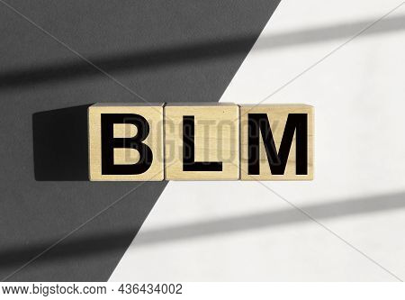 Blm Acronym For Black Lives Matters Movement. Abstract Concept With Gray-black And White Parts.