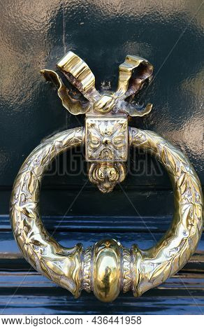 European Vintage Old Metal Wrought Iron Door Knocker. Design Detail. Paris.