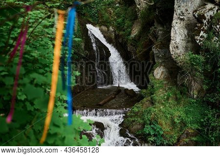 Estyube Waterfall At Lake Teletskoye In The Altai Mountains.