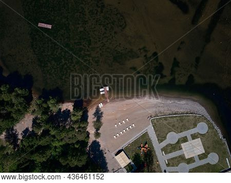 Motor Boat Moored To The Shore Of A Mountain Lake. Russia, Altai Republic, Ulagansky District, Lake 