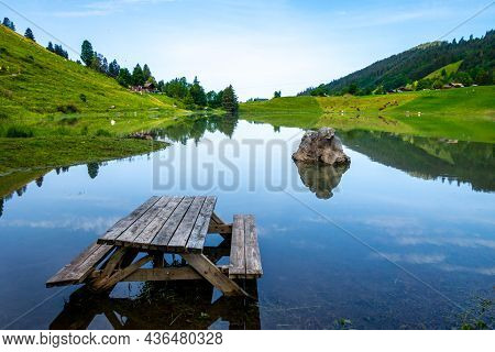 Lake Of The Confins And Mountain Landscape In La Clusaz, Haute-savoie, France