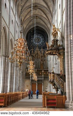 Sweden, Uppsala - April 19 2019: Interior View Of Uppsala Cathedral, Vaulted Ceiling And Chandeliers