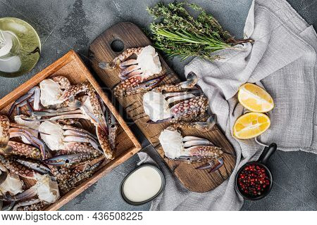 Fresh Raw Blue Swimming Crab Ocean Gourme Parts Set, On Gray Background, Top View Flat Lay