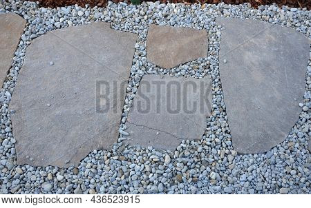 Laying Porphyry Of Large Flat Stones. The Paving Is Laid In Some Gravel, The Joints Are Then Filled 