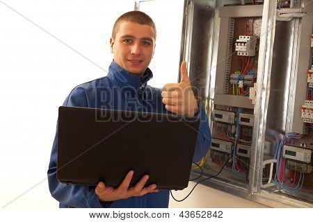 Handyman Working With Laptop