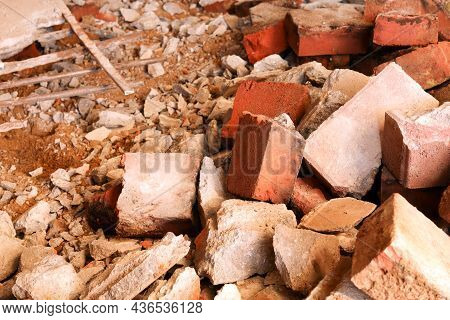 Dismantling, Disassembling The Floor. Smashed Concrete And Bricks Floor. Destroying Concrete Surface