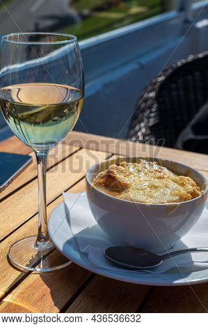French Caramelized Onion Soup With Croutons And Gruyere Cheesse From Oven