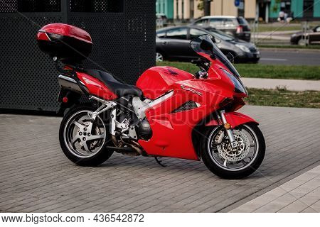 Minsk, Belarus, October 2021 - Honda Vfr , Red Motorcycle On The Street In The City.
