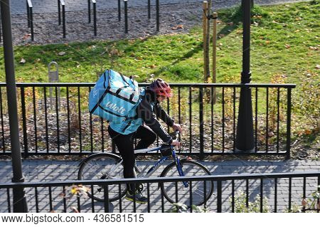 Vilnius - October 14: Wolt Delivery Man At October 14, 2021 In Vilnius, Lithuania. Wolt Is A Food De
