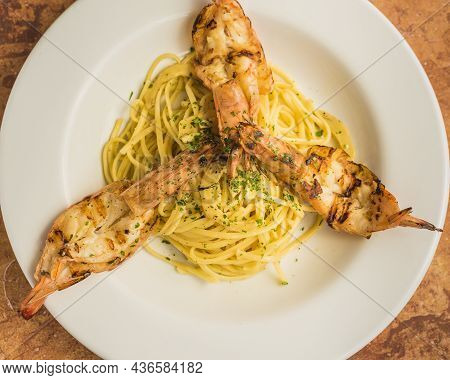 Seafood Spaghetti With Shrimps And Olive Oil From A Top View