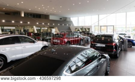 Luxury Cars In The Interior Of A Car Dealership, Blur Photo