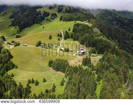 Panoramic View On Mountain Villages, Green Forests And Apline Meadows Near Saint-gervais-les-bains,