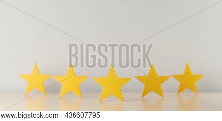 Five Yellow Wooden Stars On Table In Row With Selective Focus On Center Star, Five Star Review For B