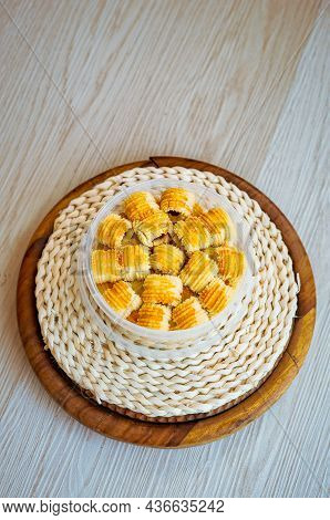 Traditional Pineapple Jam Tart Roll Cookies Or A Malay Called Tart Nanas In A Plastic Container.
