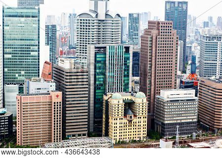 Osaka, Japan - 18 May, 2015: View From Above On Osaka City With Skyline With Skycrapers, Highways An