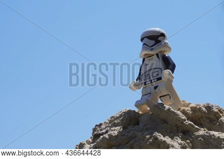 Chernihiv, Ukraine, July 13, 2021. A Plastic Imperial Stormtrooper From Star Wars Against A Clear Sk