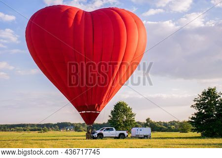 Russia, Voronezh - August 3, 2020. Hot Air Balloon. Big Red Hot Air Balloon Heart Shaped Balloon In 