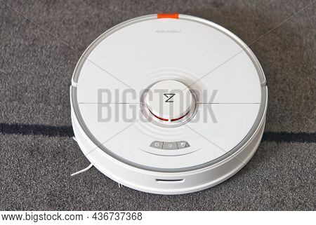 Tallinn, Estonia - October 10, 2021: Xiomi S7 Roborock Vacuum Cleaner Performs Automatic Cleaning Of