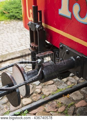 Coupling Connects Hooks On The Adjoining Red Wagons. Type Of Connection Between Tram Cars With Buffe