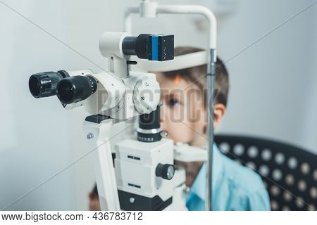 Ophthalmologist Checks The Boy's Vision. Hyperopia. Vision Tests In Children.